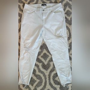 Distressed ankle jeans